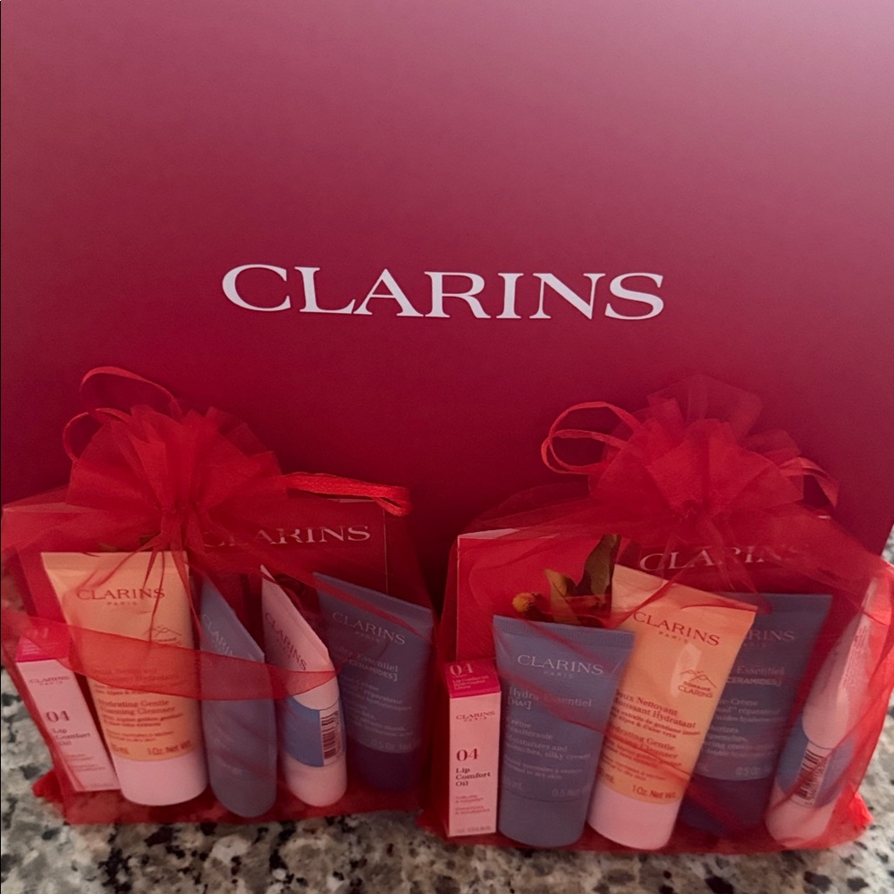 Clarins Skincare Collection with Red Organza Bags 2 set